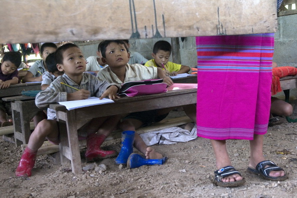Children attend a school in Mae La refugee camp which is